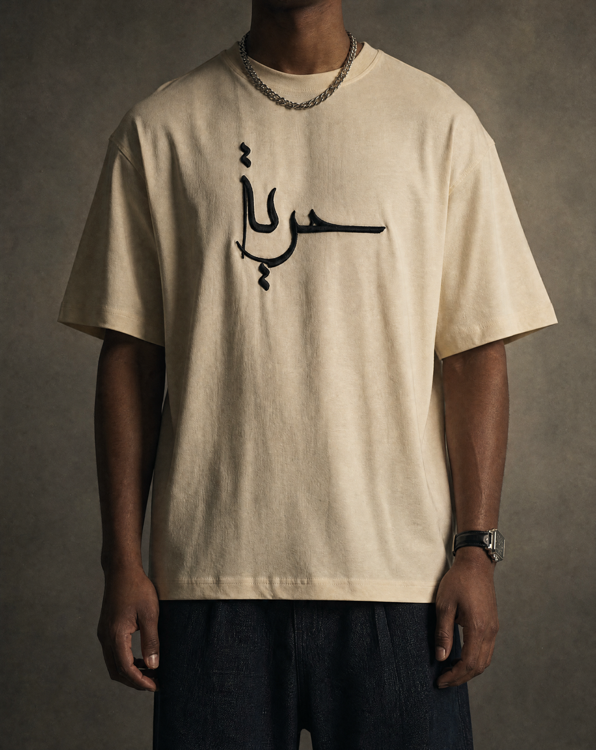 7AAL Man Hurriyya Tee in cream, oversized embroidered heavyweight t-shirt, front view