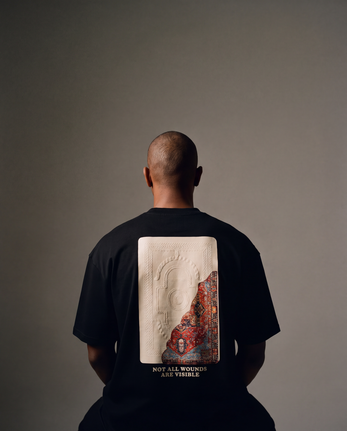7AAL Man Jiraah Tee in black, oversized embroidered heavyweight t-shirt, back view