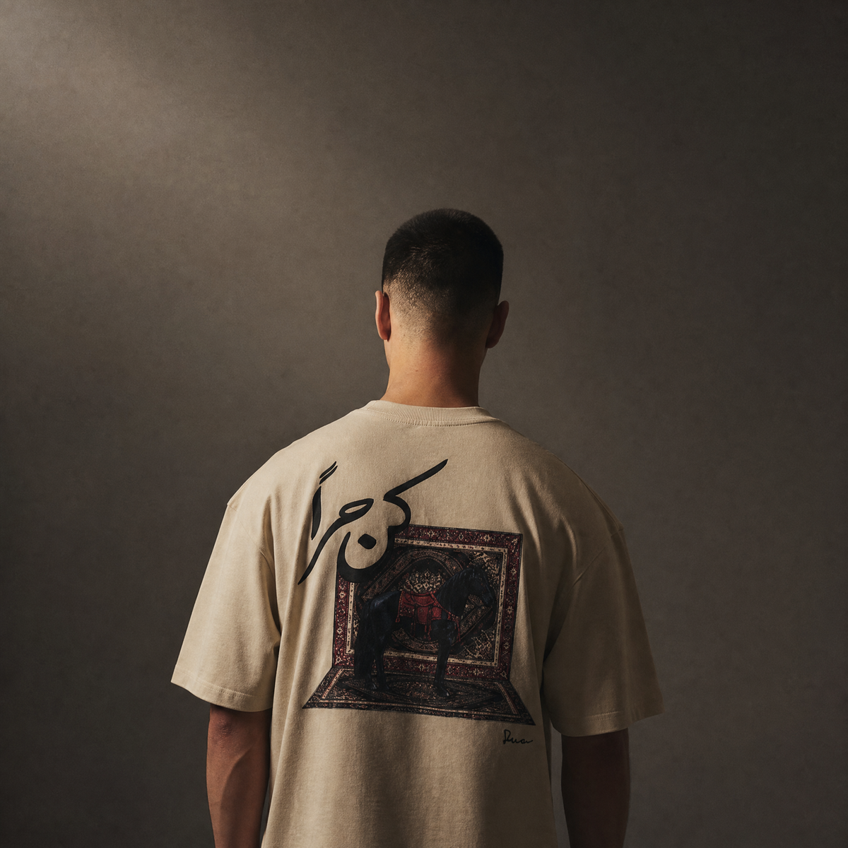 7AAL Man Kun Hurran Tee in sand, oversized embroidered heavyweight t-shirt, back view