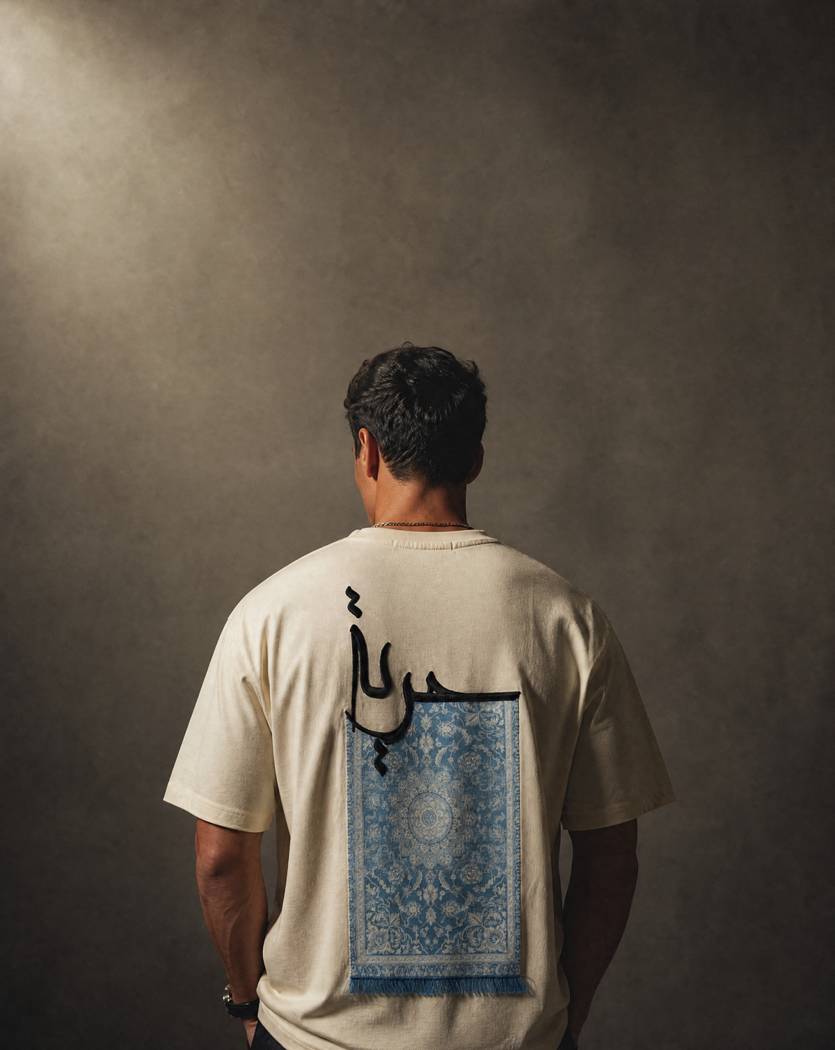 7AAL Man Hurriyya Tee in cream, oversized embroidered heavyweight t-shirt, back view