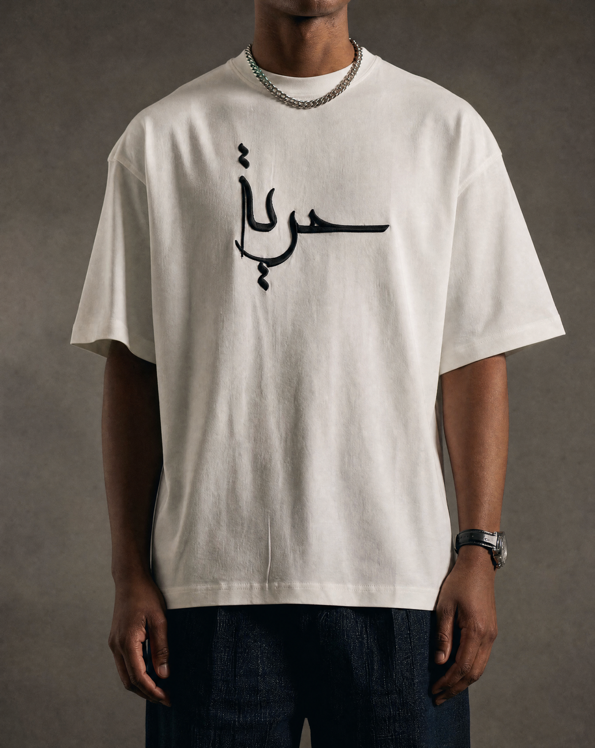 7AAL Man Hurriyya Tee in white, oversized embroidered heavyweight t-shirt, front view