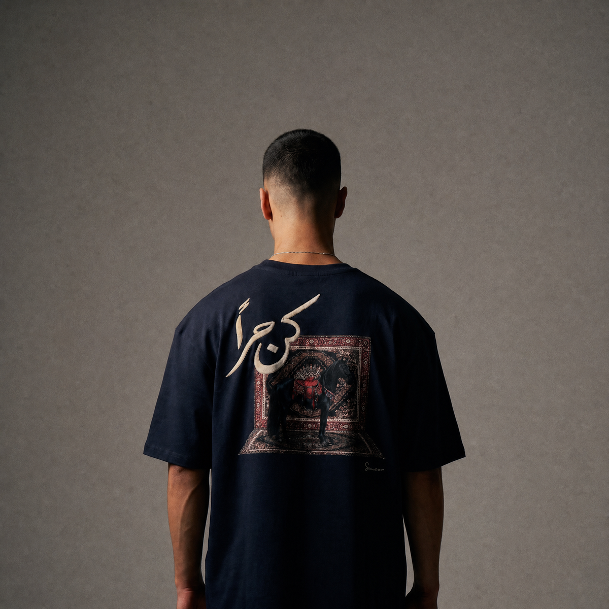 7AAL Man Kun Hurran Tee in navy, oversized embroidered heavyweight t-shirt, back view