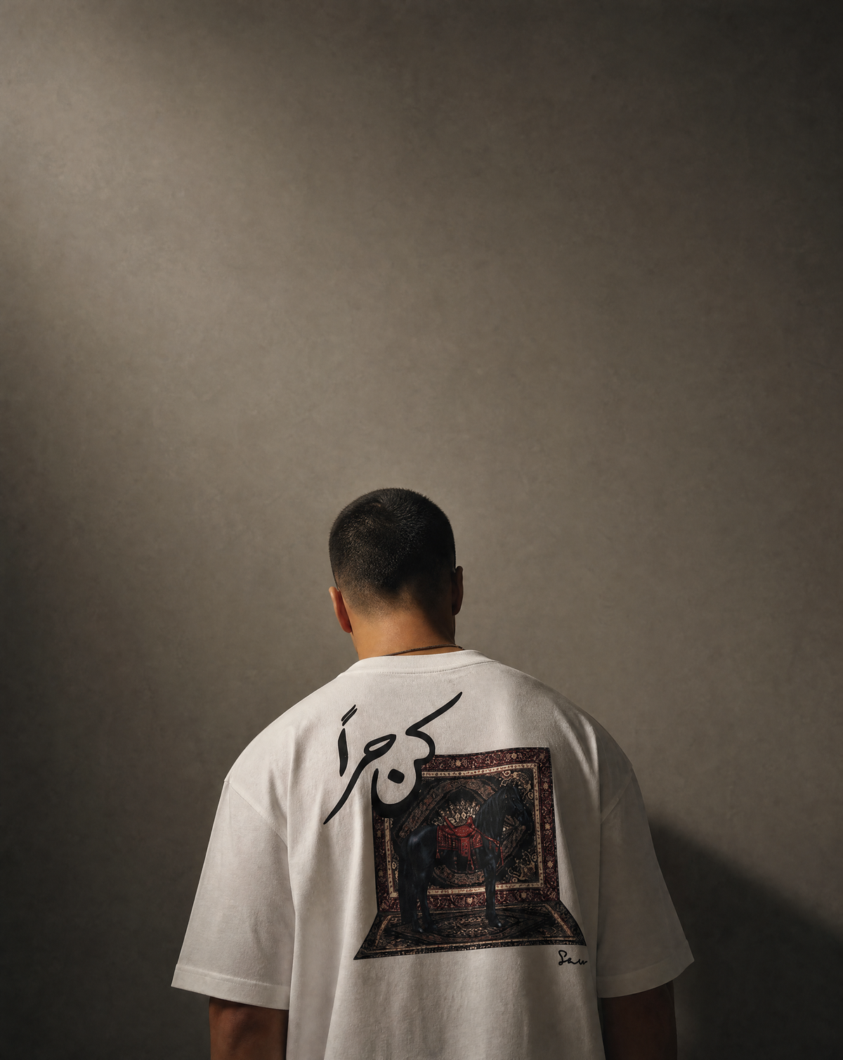 7AAL Man Kun Hurran Tee in white, oversized embroidered heavyweight t-shirt, back view